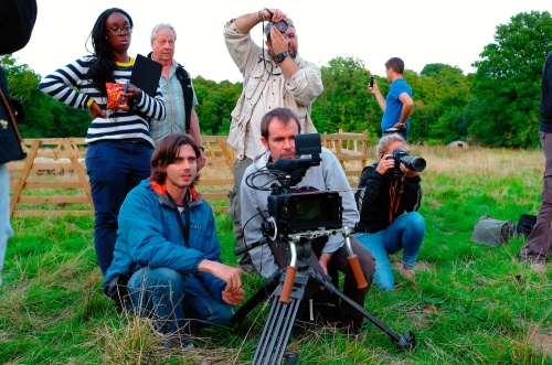 Edmond Terakopian photographing the New Look video shoot of their Autumn / Winter 2013 collection. Advertising film by Cherry Duck. Walnuts Farm, Old Heathfield, East Sussex, UK. August 22, 2013. Photo: ©James Vellacott