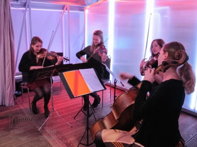 A string quartet from the Royal College of Music performs at the opening and private view of 